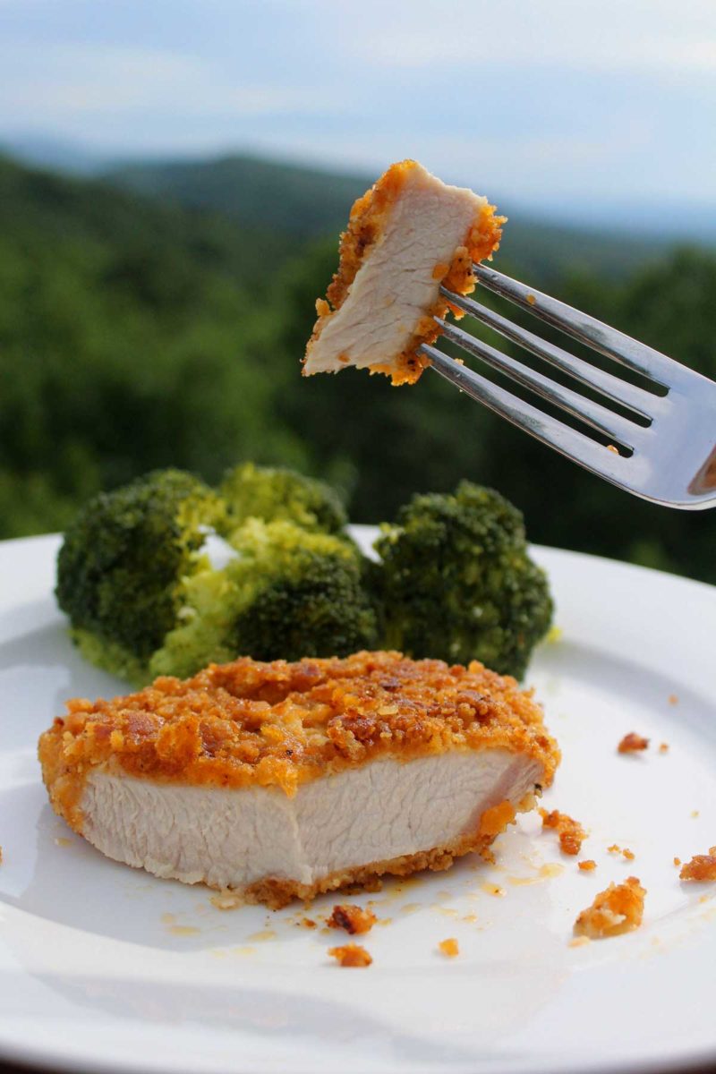 bite-size piece of pork chop on fork