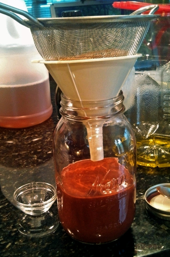 This tangy and sweet raspberry vinaigrette is easy to make and can be enjoyed all year round by using fresh or frozen raspberries. | TheMountainKitchen.com