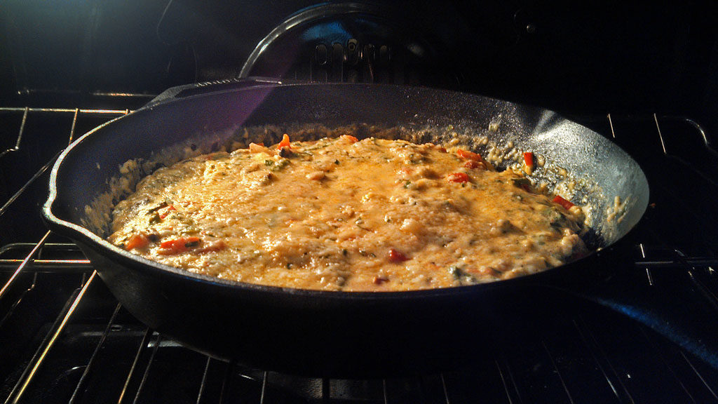 Have breakfast for supper with this vegetable herb frittata is made with fresh asparagus, red bell peppers, mushrooms and onions. A tasty meal any time! | TheMountainKitchen.com