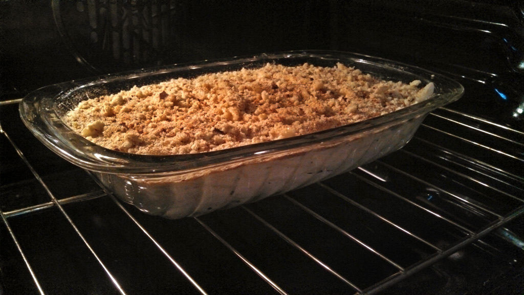 Adult macaroni and cheese baking in the oven