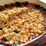 Celebrate your favorite summer berry with this blueberry crisp. Warm tart blueberries topped with a pecan cinnamon and oat topping. | TheMountainKitchen.com