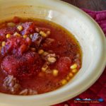 This comforting and hearty crock-pot vegetable beef soup has chunks of beef, stewed tomatoes, corn and lima beans. A delicious soup with very little effort! | TheMountainKitchen.com
