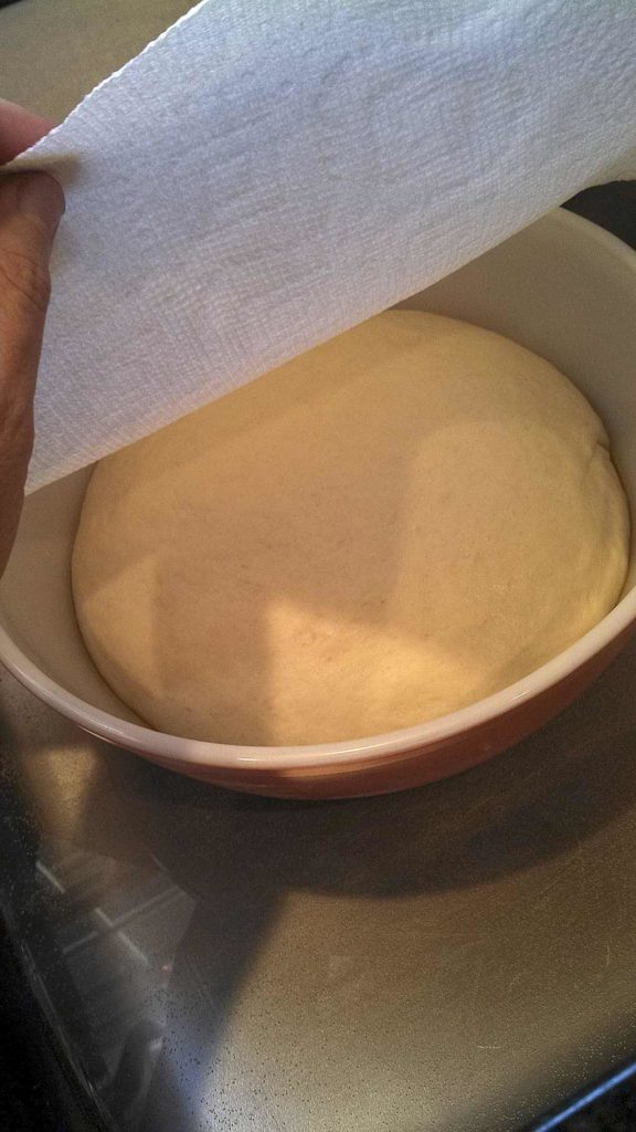 ball of homemade focaccia dough in bowl