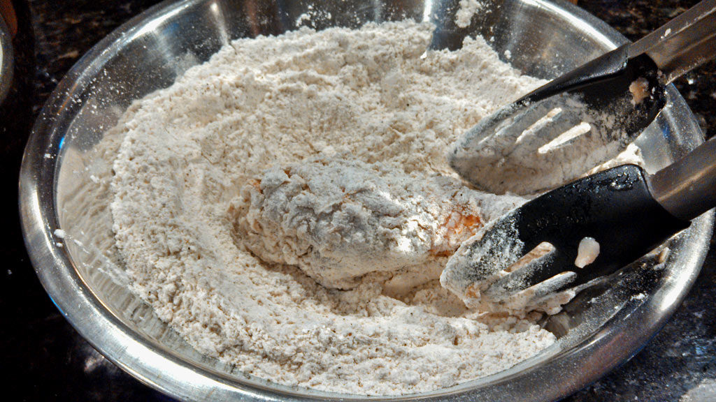 double-dipping chicken into flour