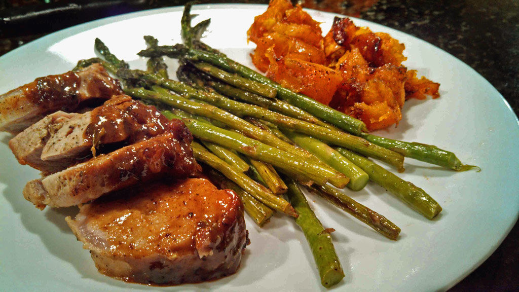 Mustard-Maple Pork Tenderloin: Oven roasted Dijon mustard pan seared tenderloin served with butternut squash and asparagus