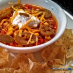 This easy to follow crock-pot Taco Soup is made of ground beef, seasoned with taco spices and cooked with beans and corn in a rich tomato sauce. Yumminess! | TheMountainKitchen.com