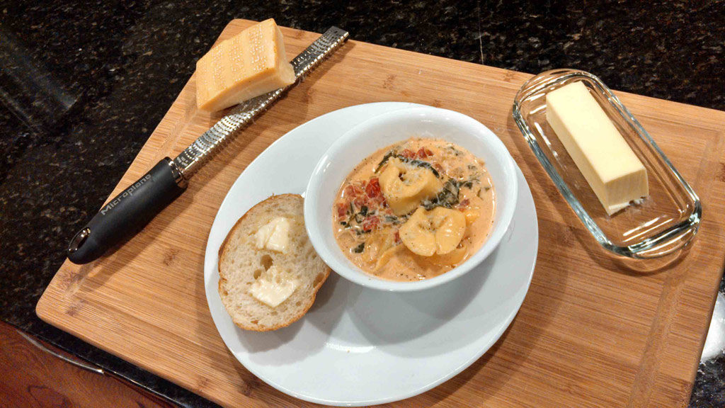 creamy tortelloni soup ready to eat