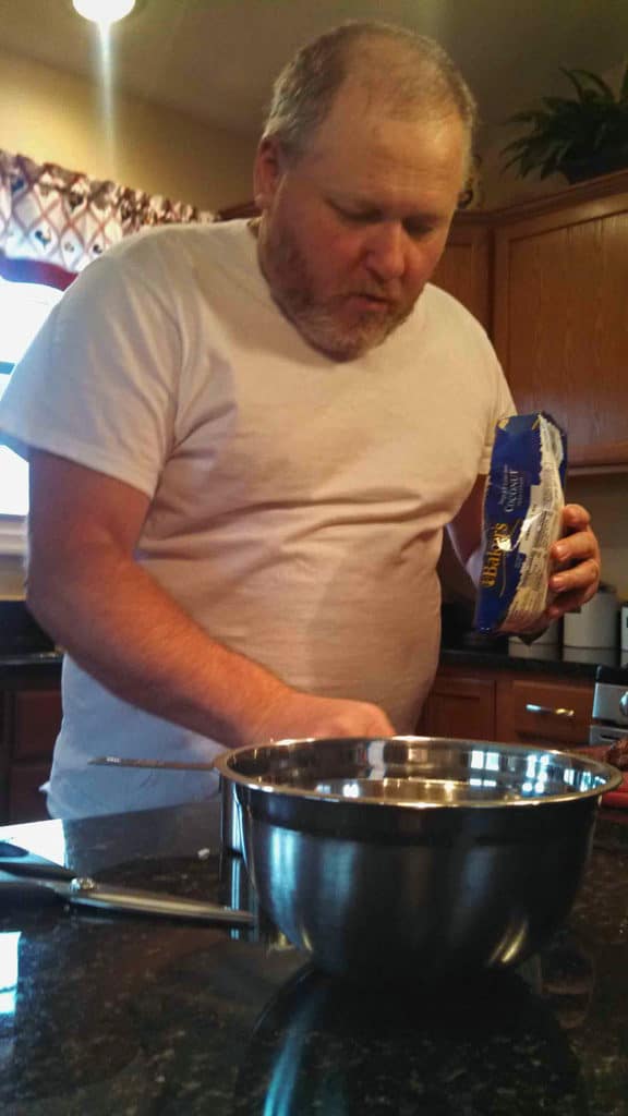 David making Mama Rosa's Date Nut Balls