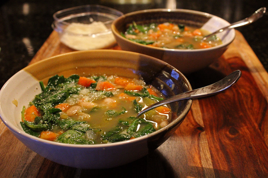 warm bowls of tuscan white bean soup ready to eat