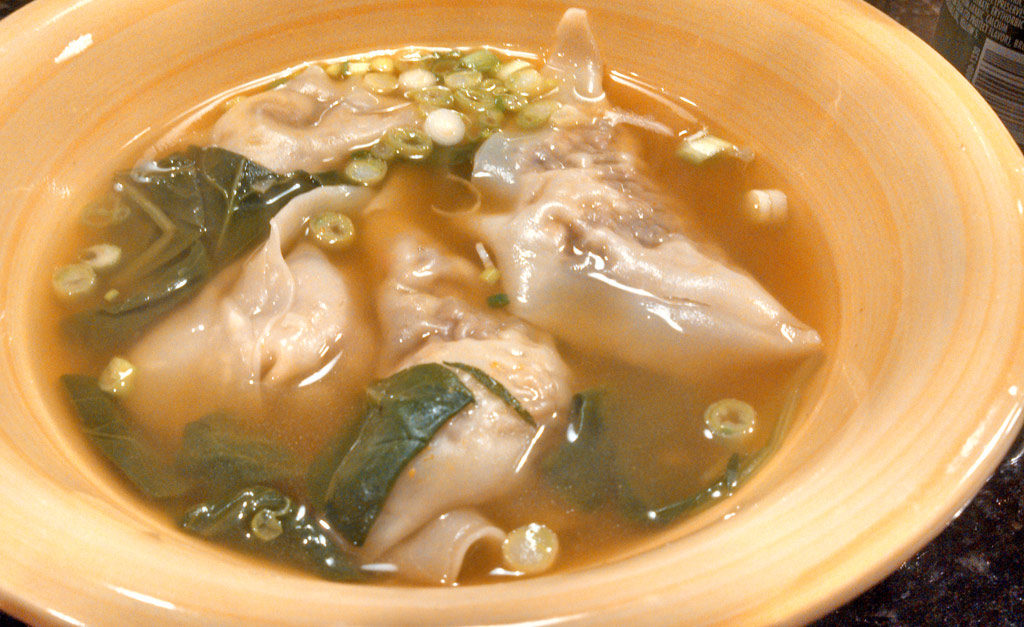 Veggie wontons are filled with fresh veggies, seasoned with warm ginger, soy sauce and duck sauce, cooked in rich vegetable broth and steeped until tender. | TheMountainKitchen.com