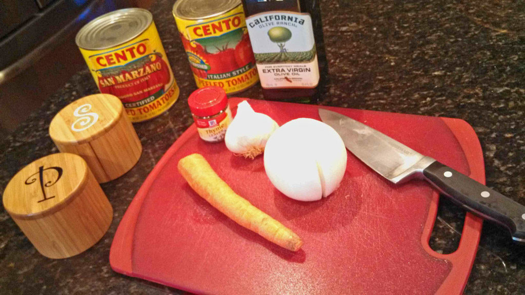 Basic tomato sauce is simply seasoned with onion, garlic and thyme, sweetened slightly with carrot; simmered until thickened. For all your Italian dishes! | TheMountainKitchen.com