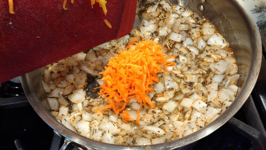 Basic tomato sauce is simply seasoned with onion, garlic and thyme, sweetened slightly with carrot; simmered until thickened. For all your Italian dishes! | TheMountainKitchen.com
