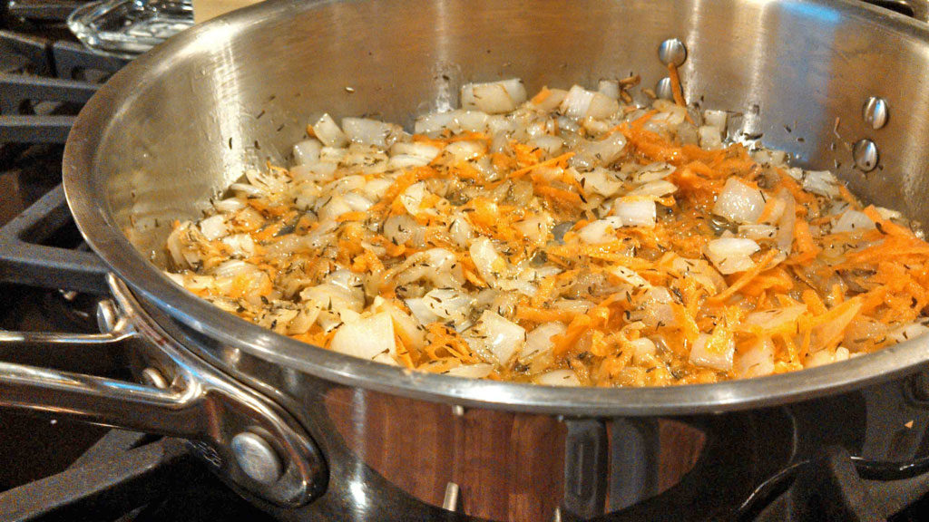 Basic tomato sauce is simply seasoned with onion, garlic and thyme, sweetened slightly with carrot; simmered until thickened. For all your Italian dishes! | TheMountainKitchen.com
