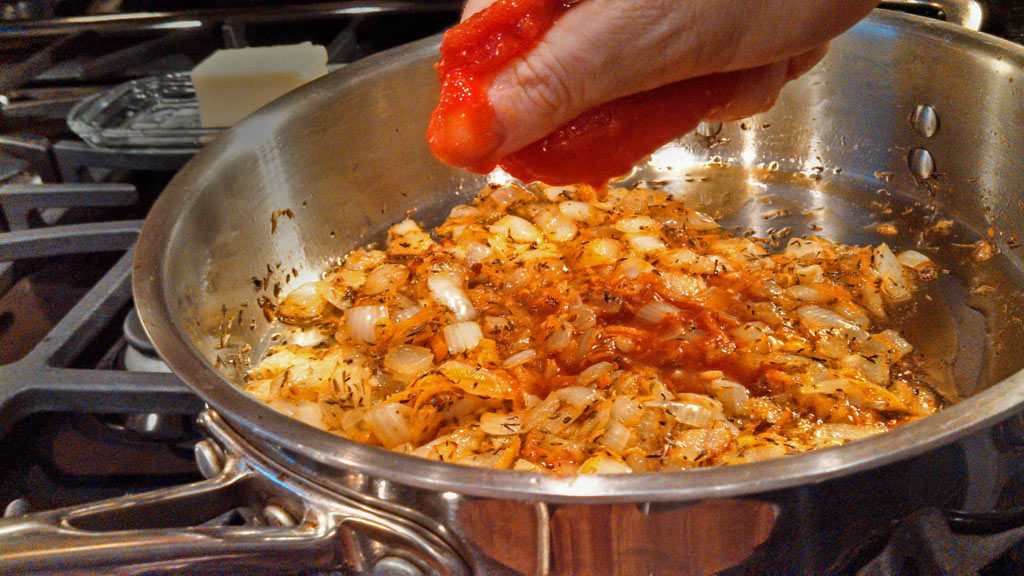 Basic tomato sauce is simply seasoned with onion, garlic and thyme, sweetened slightly with carrot; simmered until thickened. For all your Italian dishes! | TheMountainKitchen.com