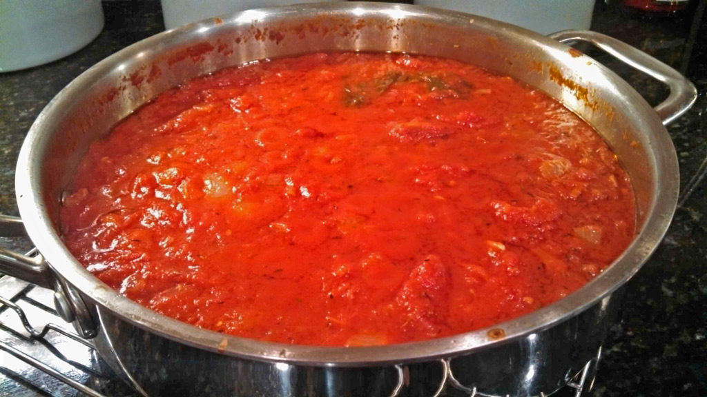 Basic tomato sauce is simply seasoned with onion, garlic and thyme, sweetened slightly with carrot; simmered until thickened. For all your Italian dishes! | TheMountainKitchen.com