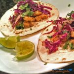 These grilled shrimp tacos have marinated, grilled shrimp on a tortilla, with red cabbage slaw and chipotle sour cream. Reinvent your taco night! | TheMountainKitchen.com