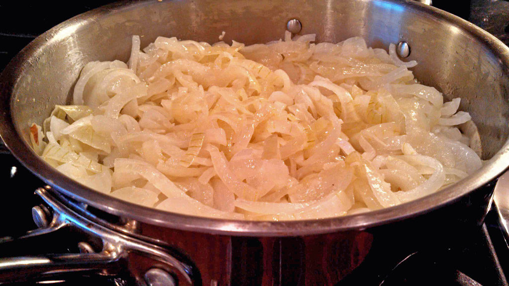 onions cooking in pan