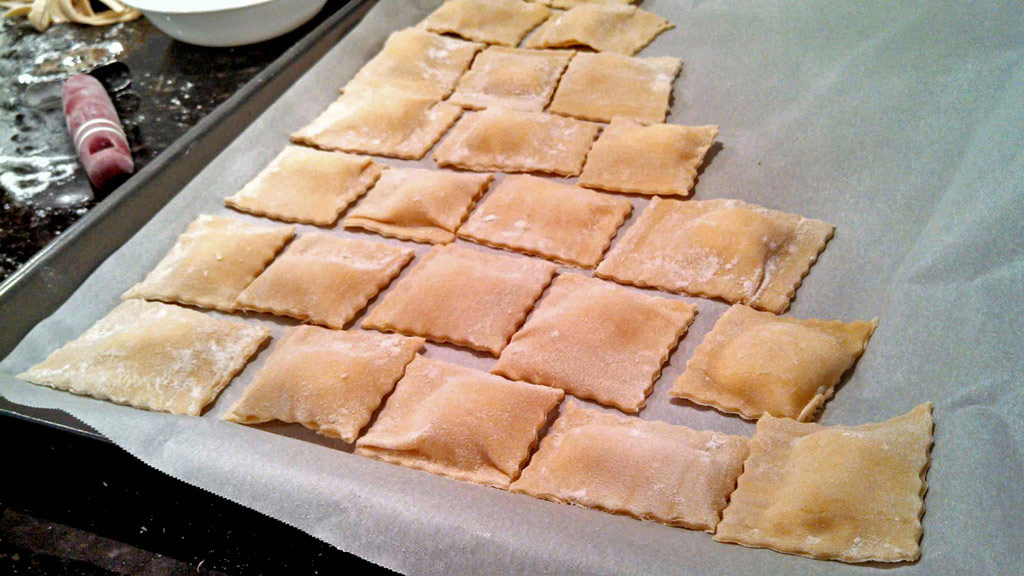 homemade ravioli on tray