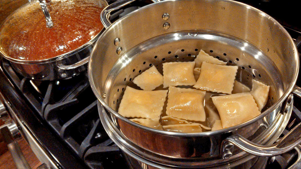 boiling pasta in pasta pot