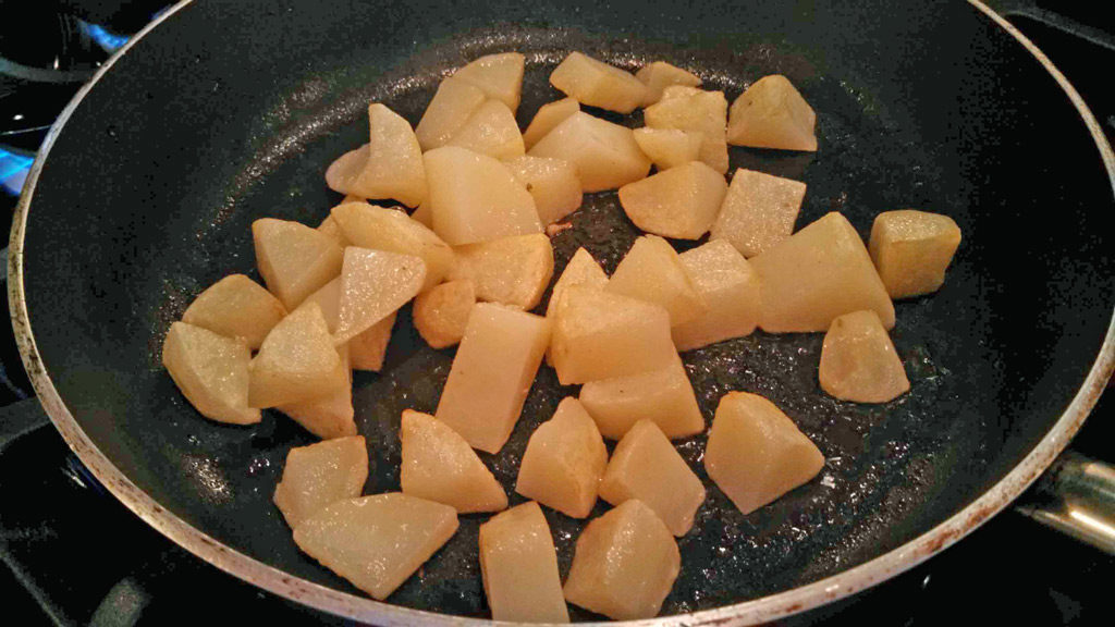 potatoes browning in skillet