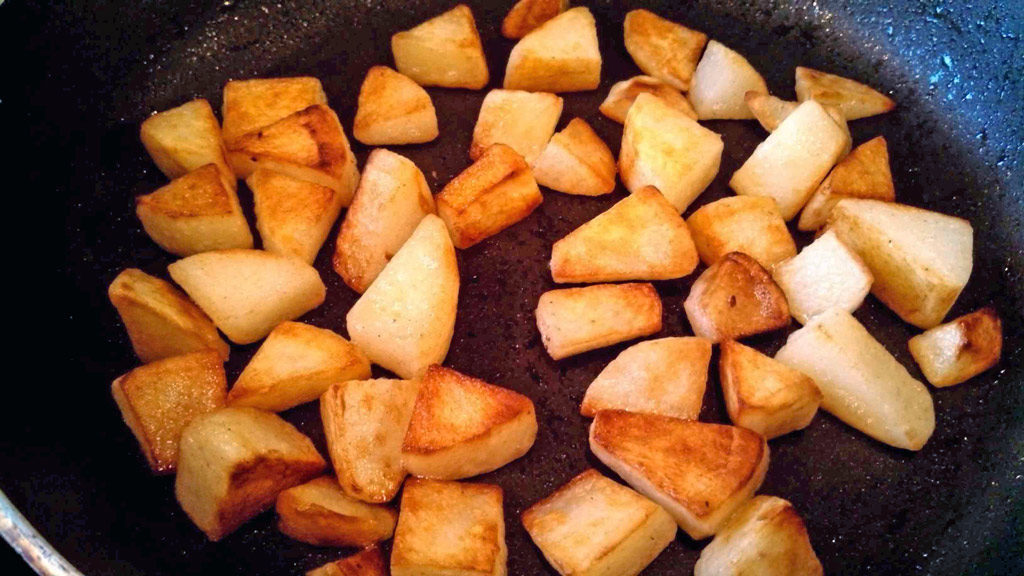 browned potatoes in skillet