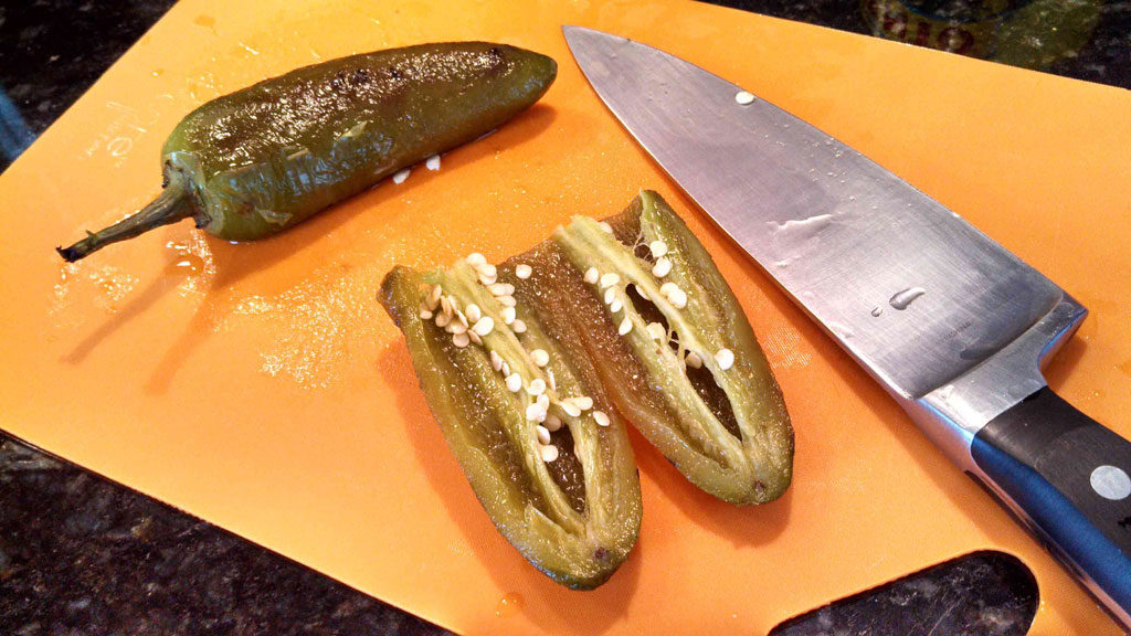 sliced jalapeno on cutting board