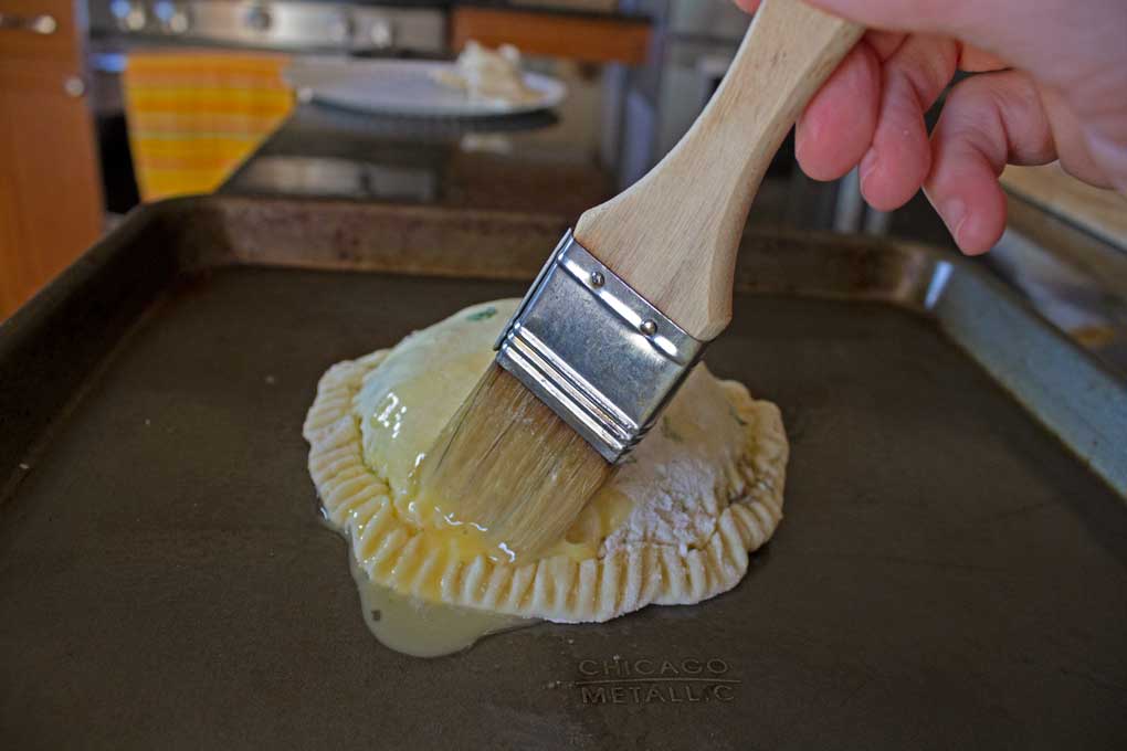 brushing mushroom wellington with egg wash