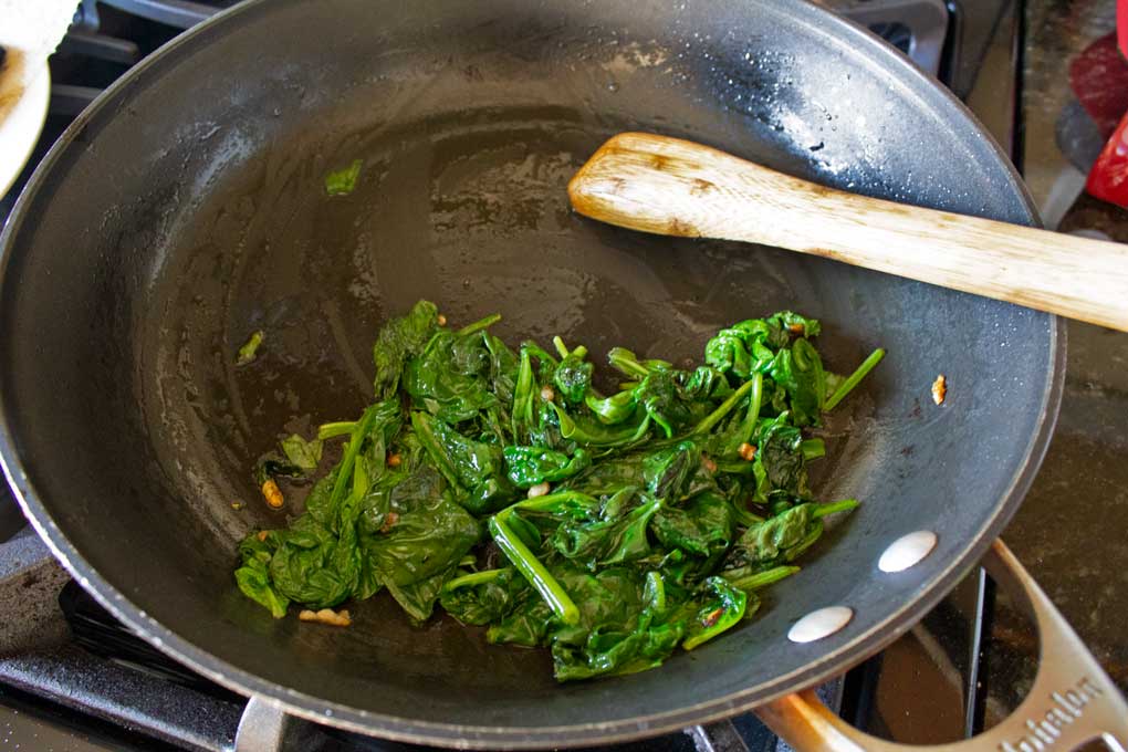 cooked spinach in skillet