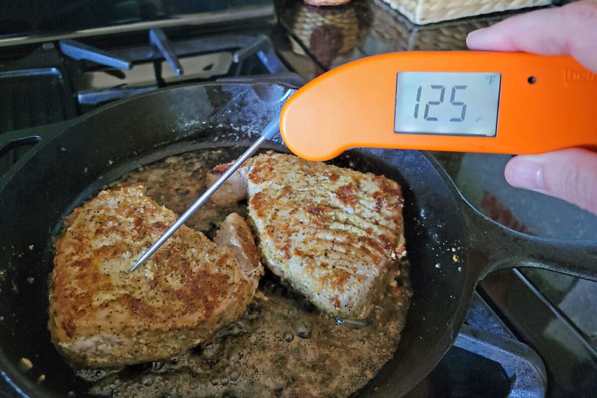 probing tuna with instant-read thermometer