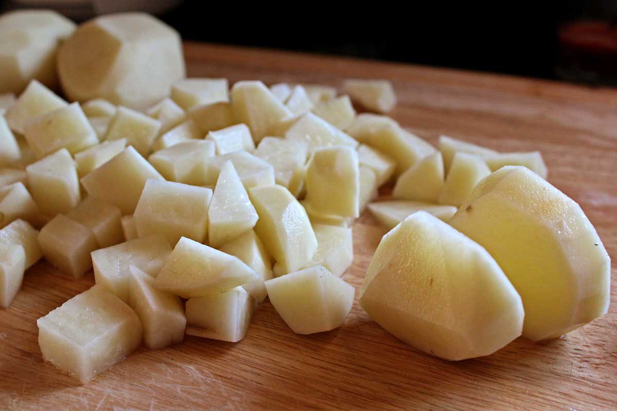diced potatoes on a cutting board