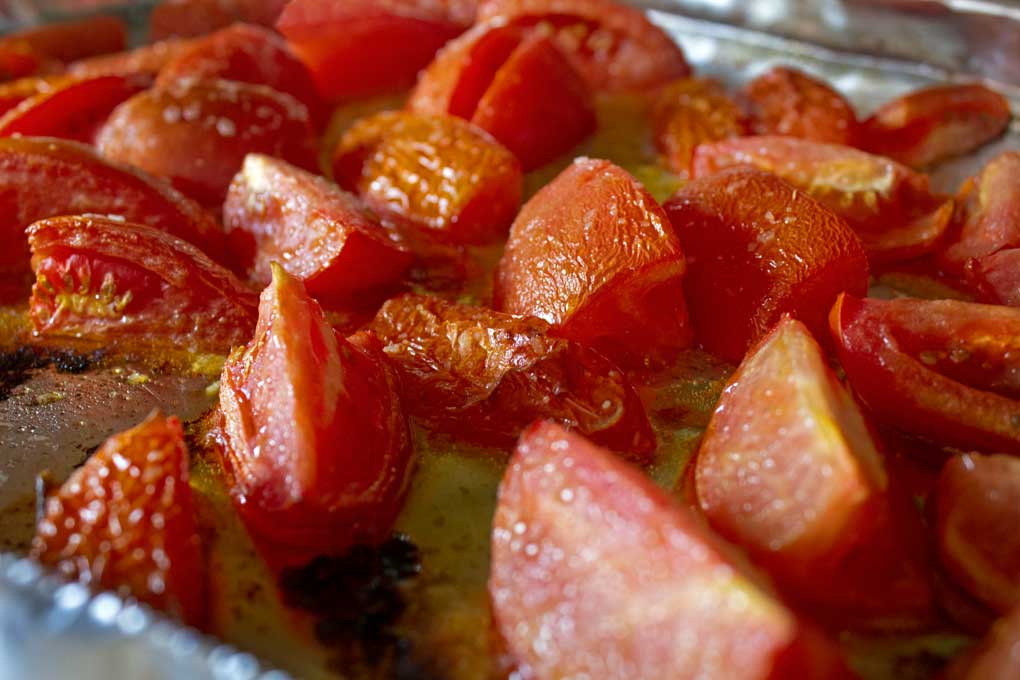 roasted tomatoes on sheet pan