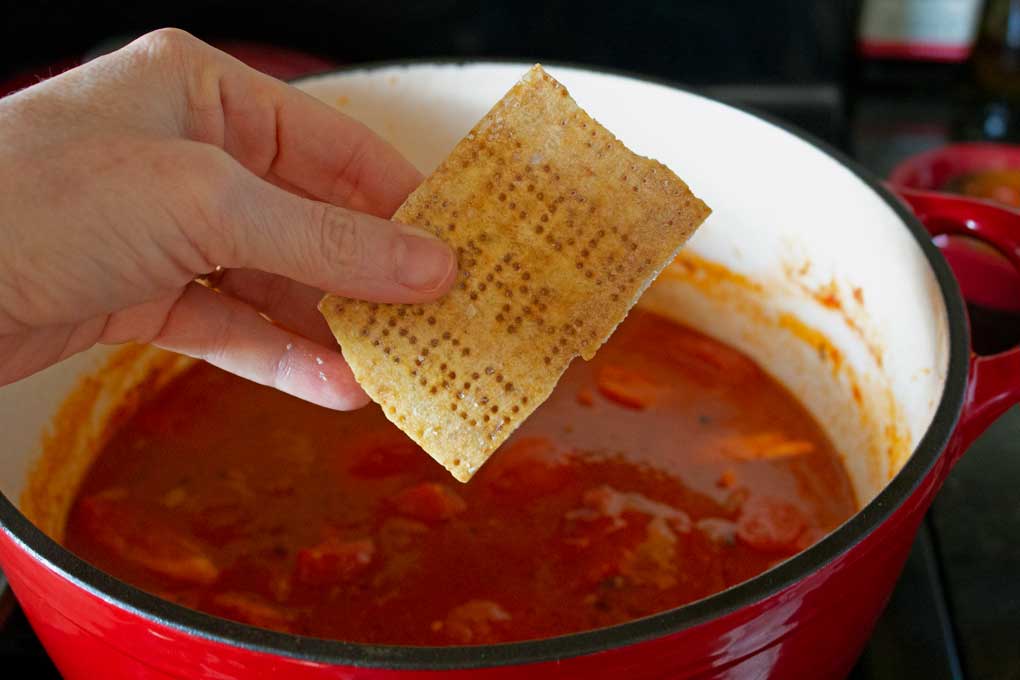 adding Parmasan cheese rind