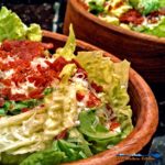 Give your Caesar salad a wow factor, by adding crispy pepperoni bits and tangy feta cheese. You'll love those tasty tidbits in the bottom of the bowl. | TheMountainKitchen.com