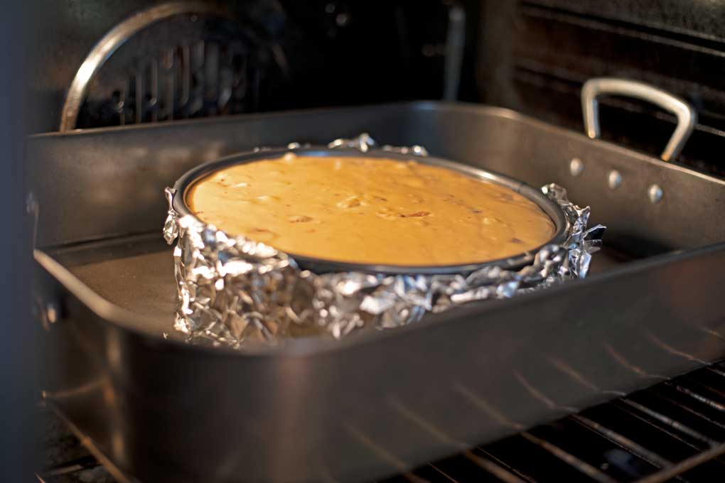 cheesecake baking inside oven