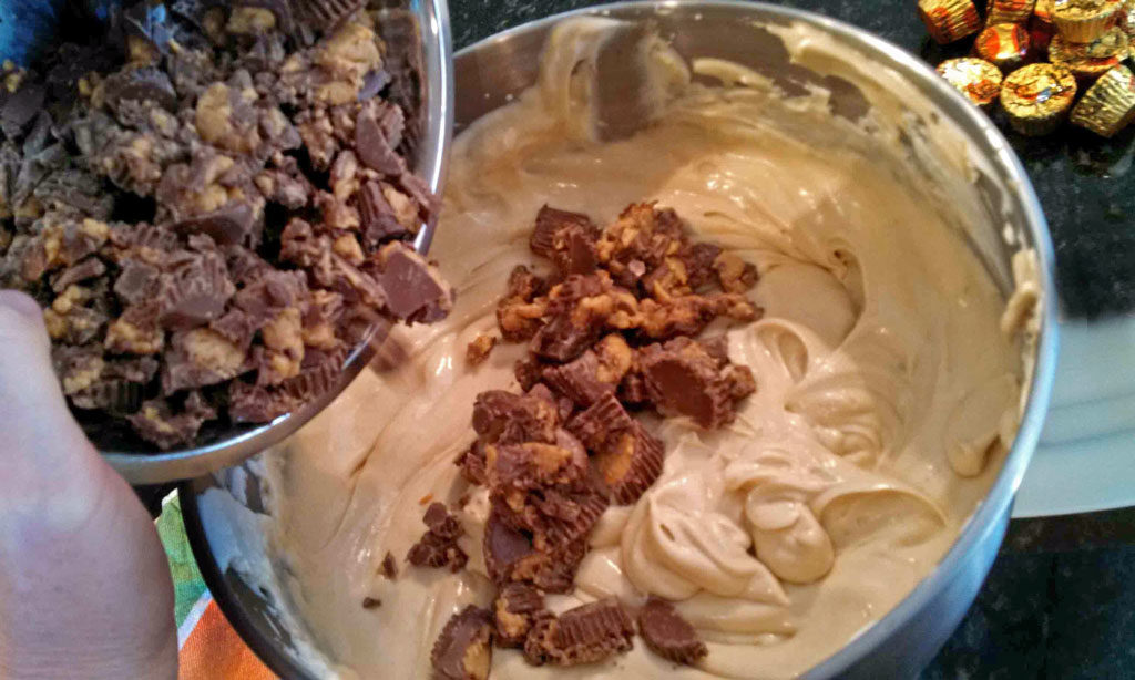 adding Reese's cups to peanut butter cheesecake filling