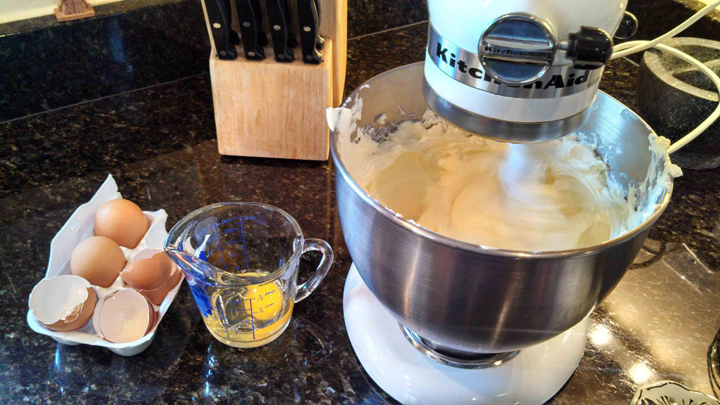 cheesecake batter mixing in mixer bowl