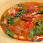 Spanish-Style White Bean Soup With Kale and Chorizo is gutsy, flavorful, and so good! Made with white beans, peppers, chorizo, and kale in a saffron broth. | TheMountainKitchen.com