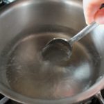 stirring water in pot