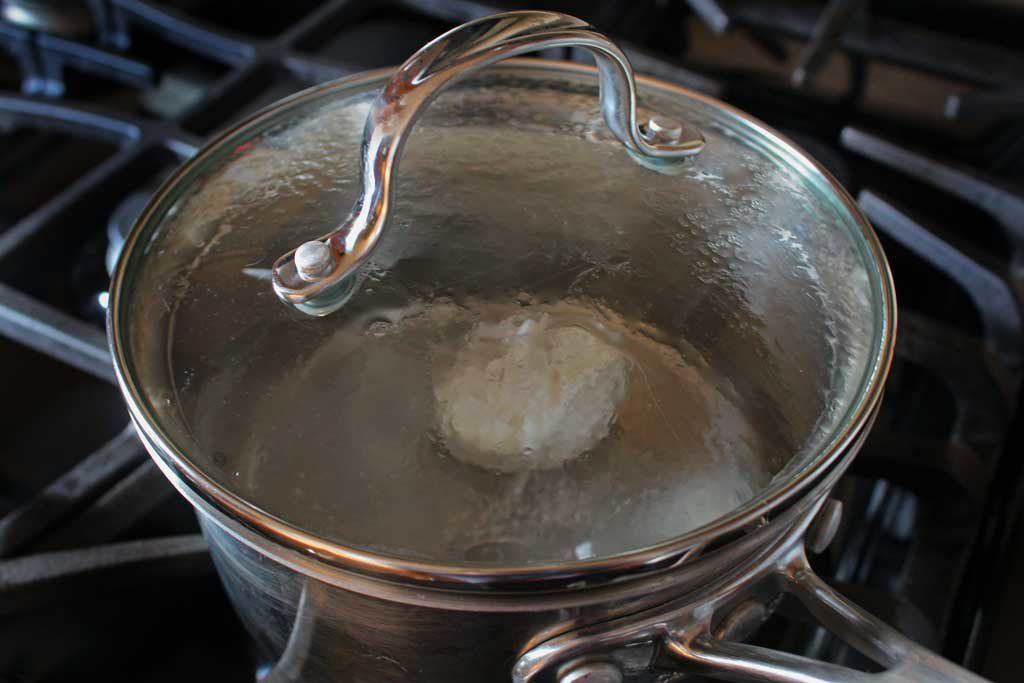 lid on pot with poached egg