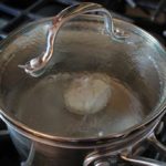 lid on pot with poached egg
