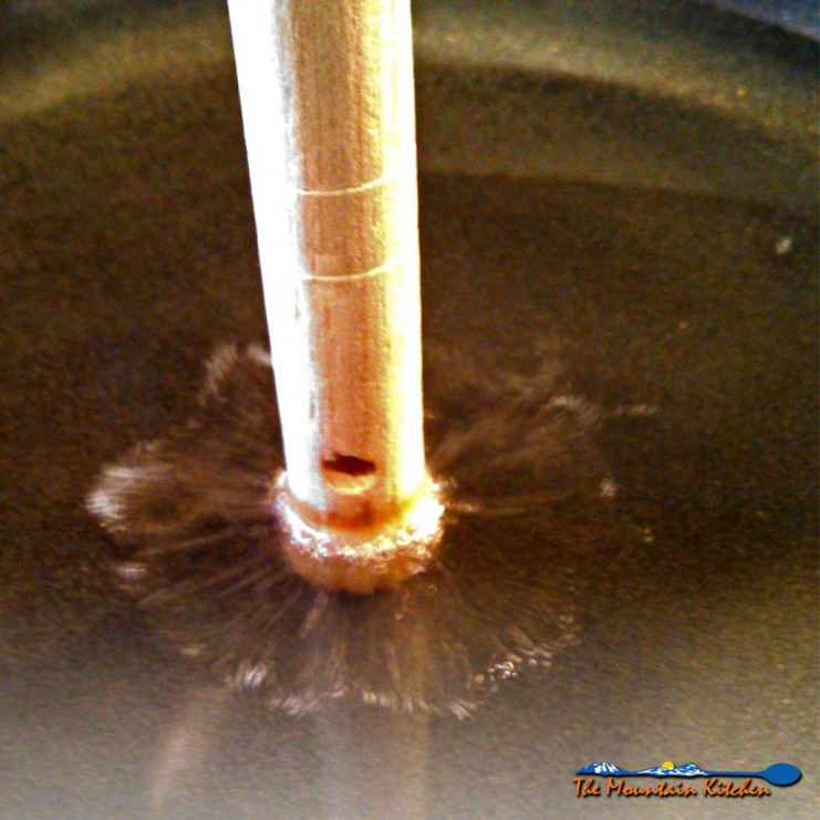 Use the wooden spoon test to figure out when grease is hot enough for frying. The oil will bubble rapidly around the spoon end when it's ready for frying. | TheMountainKitchen