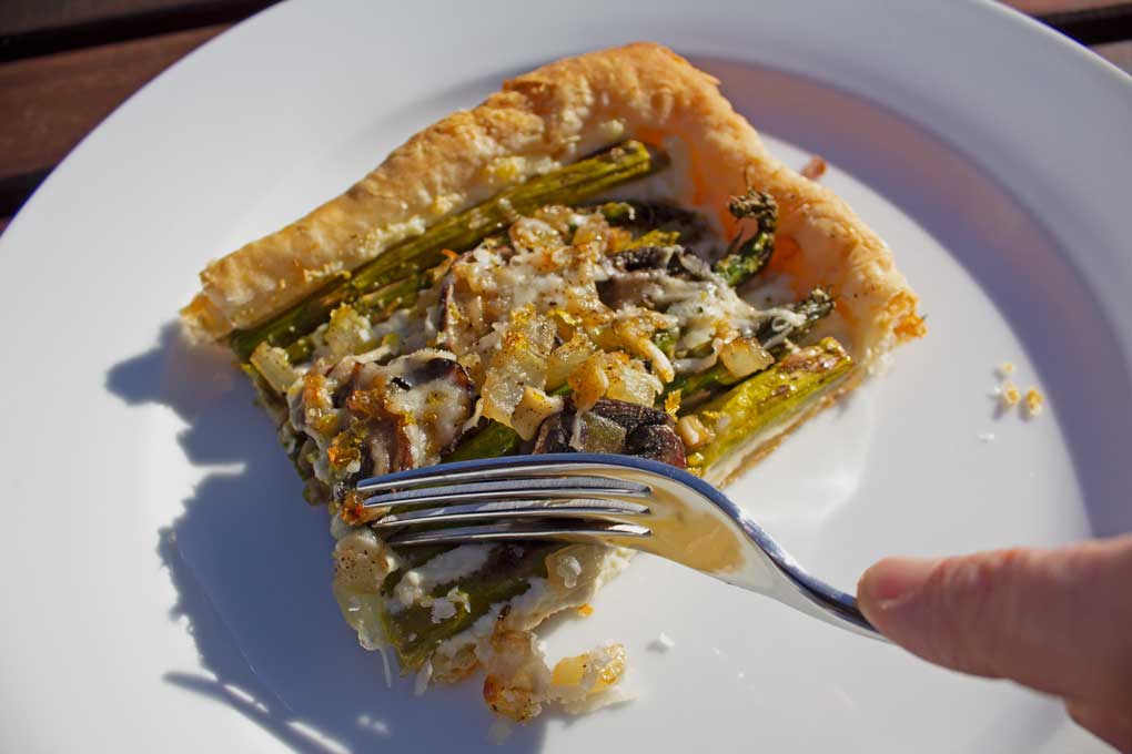sticking fork into a slice of tart