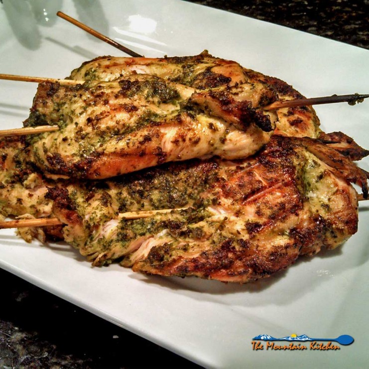 Grilled Cilantro Pesto Chicken Sandwiches are made with chicken marinated and grilled with a cilantro pesto with pine nuts, garlic and parsley, on a bun. | TheMountainKitchen.com