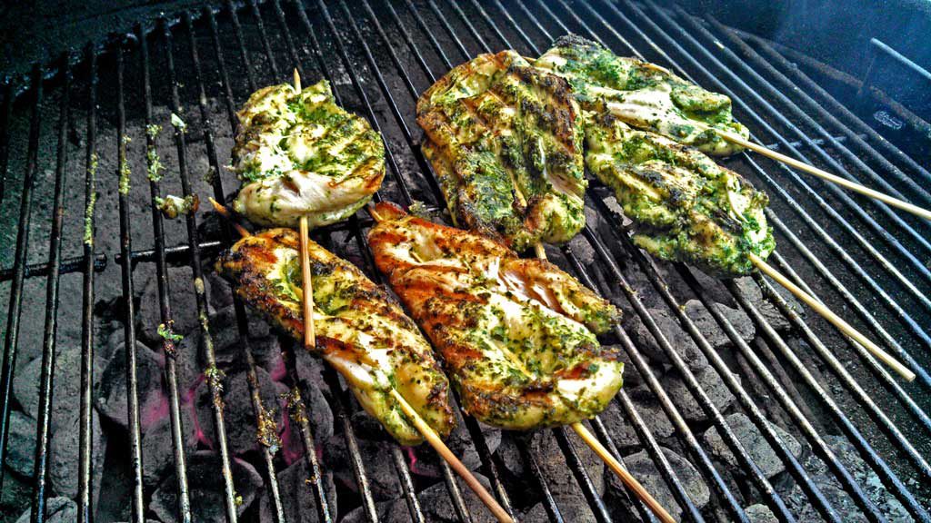 Grilled Cilantro Pesto Chicken Sandwiches are made with chicken marinated and grilled with a cilantro pesto with pine nuts, garlic and parsley, on a bun. | TheMountainKitchen.com