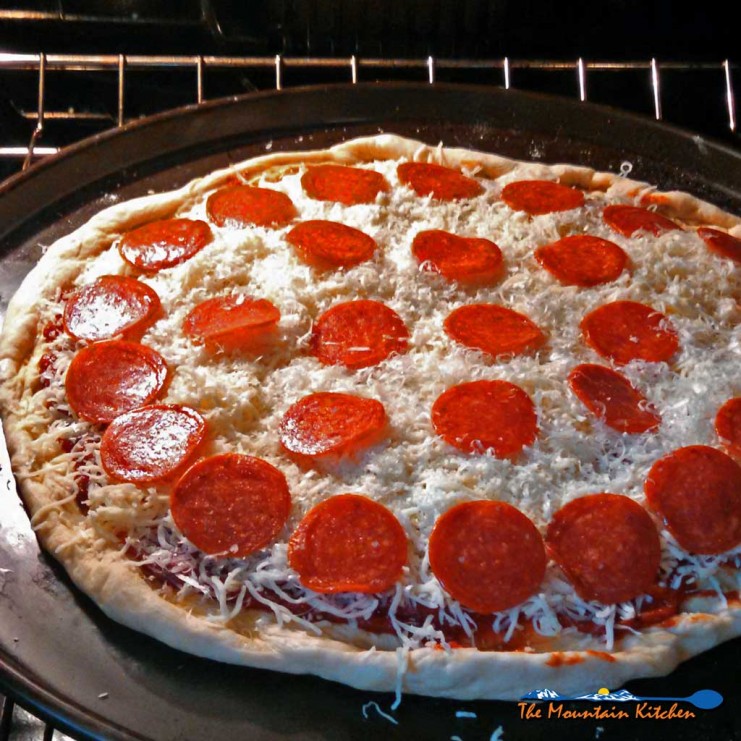 This quick and easy homemade pizza sauce is as basic as you can get. Loaded with flavor this pizza sauce can be made in minutes for quick delicious pizza! | TheMountainKitchen.com