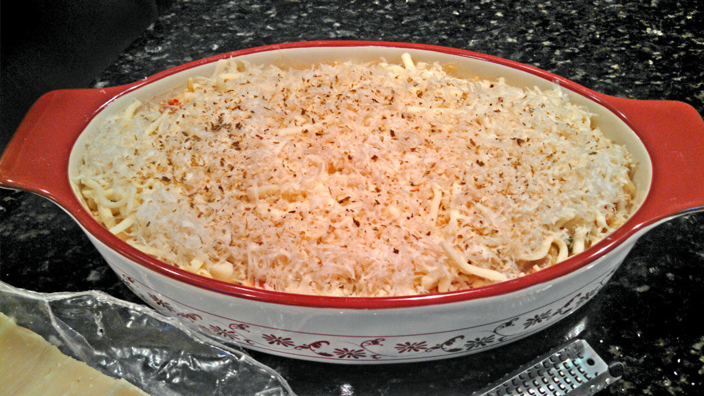 Spaghetti Squash Casserole is a healthy and comforting way to prepare spaghetti squash mixed with mushrooms, tomatoes, onion, ricotta and mozzarella cheese.