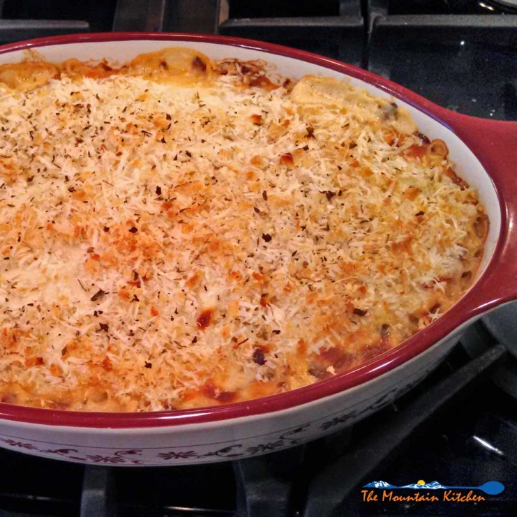 Spaghetti Squash Casserole is a healthy and comforting way to prepare spaghetti squash mixed with mushrooms, tomatoes, onion, ricotta and mozzarella cheese.