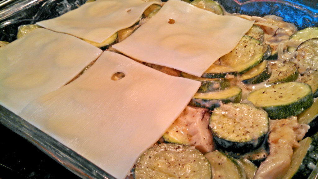 covering vegetables with cheese