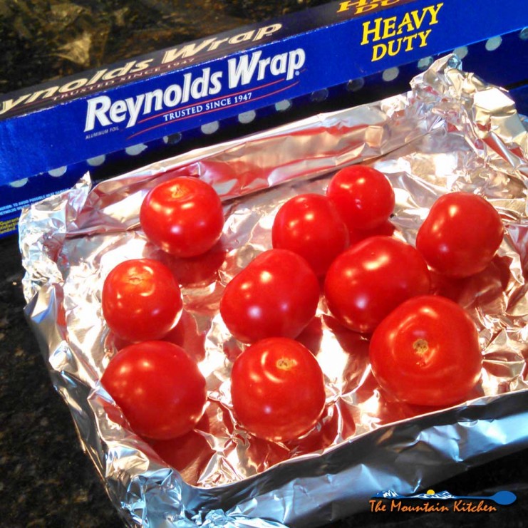 Instead of buying a grilling basket use aluminum foil. Shape the foil into the shape of a box, place on the grill, and poke holes in it. An inexpensive fix! | TheMountainKitchen.com