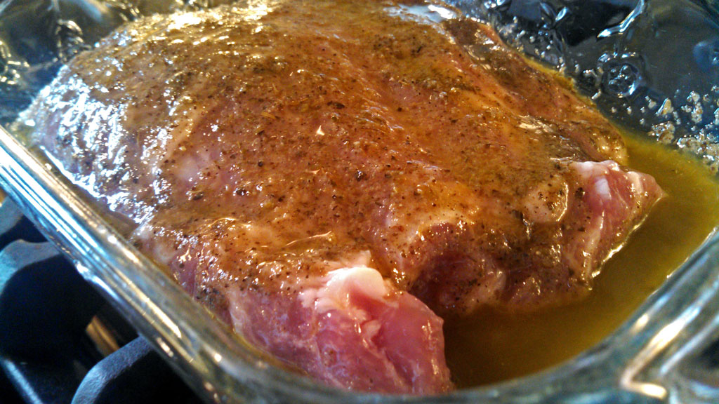 ribeye roast covered in Greek dressing